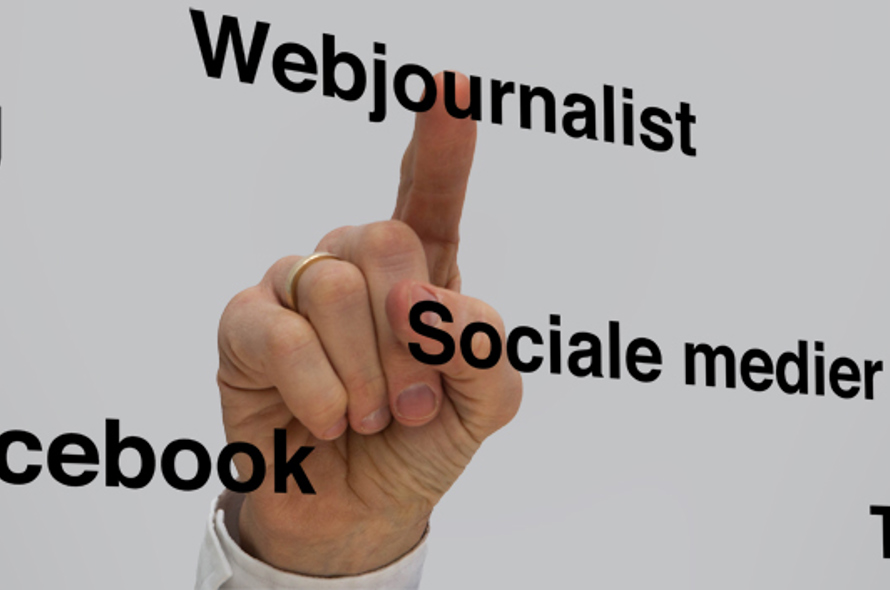 En hånd peger op mod ordet Webjournalist